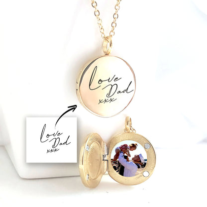 Locket engraved with kids drawings.