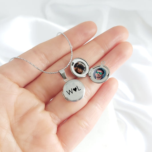 Anniversary tiny locket with engraving and photos.