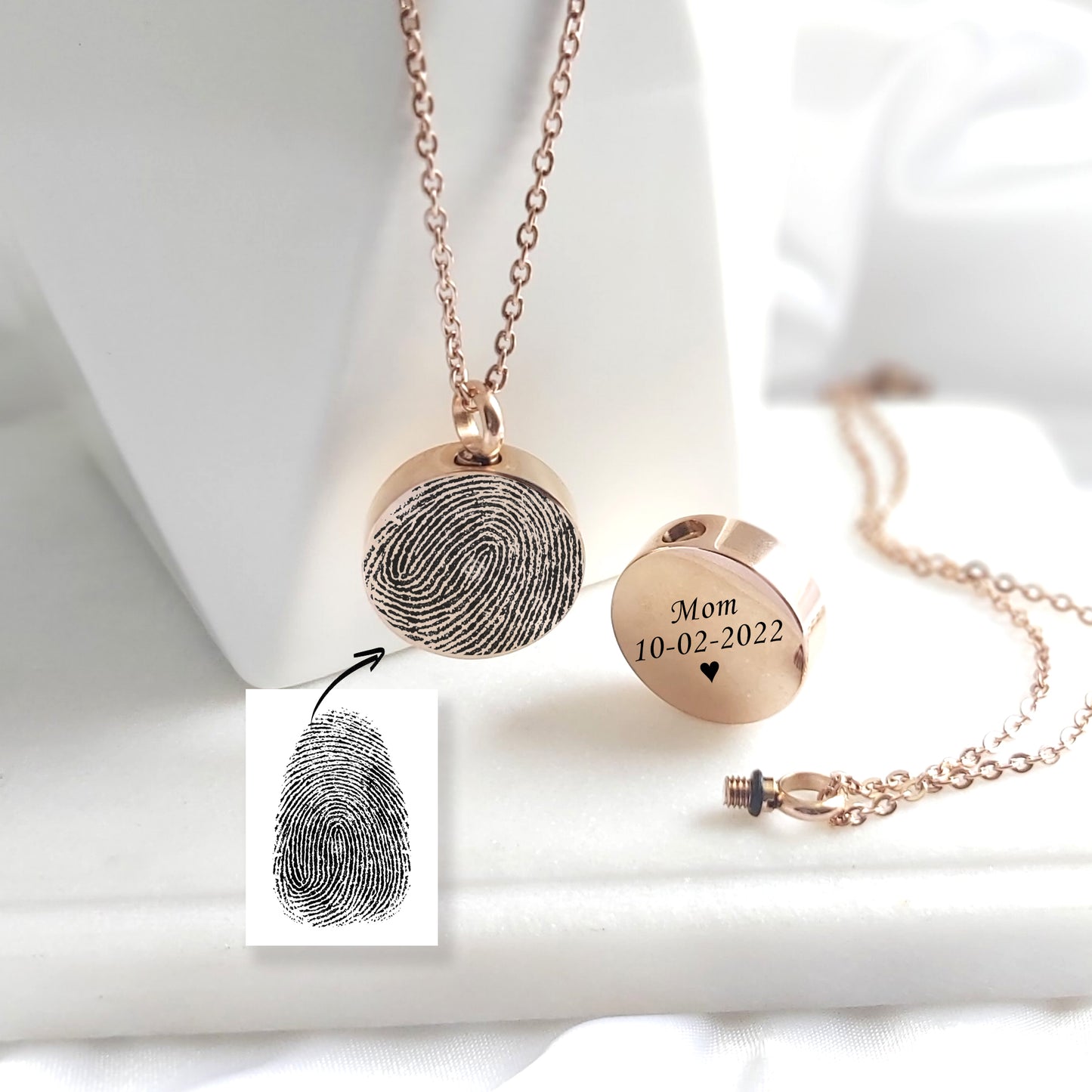 Actual thumbprint urn necklace for human ashes.