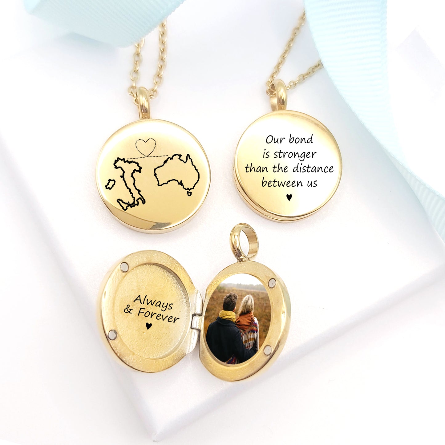 Two country map locket with photos.