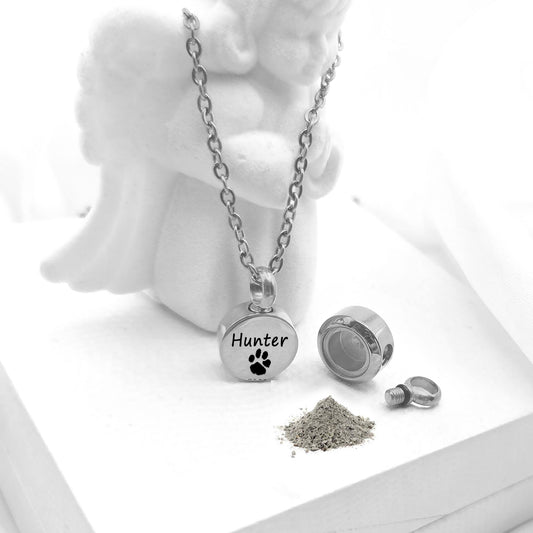 Personalized pet cremation urn necklace for ashes or hair.