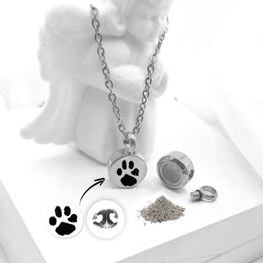 Personalized paw print cremation urn necklace for ashes or hair.