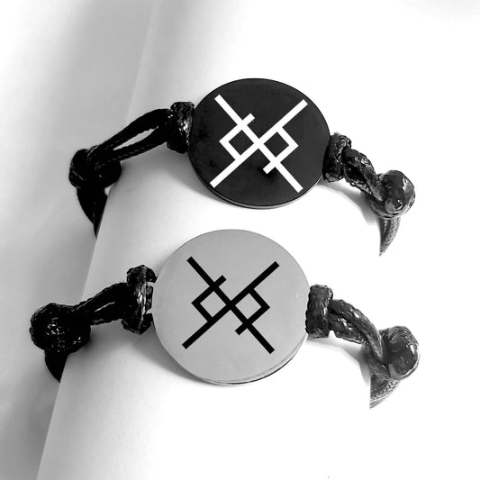 Bracelet with black and silver with viking love symbol engraved on a white background